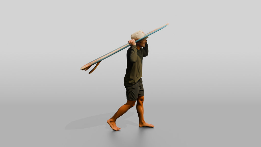 Man Lifting Surfboard Onto His Shoulder