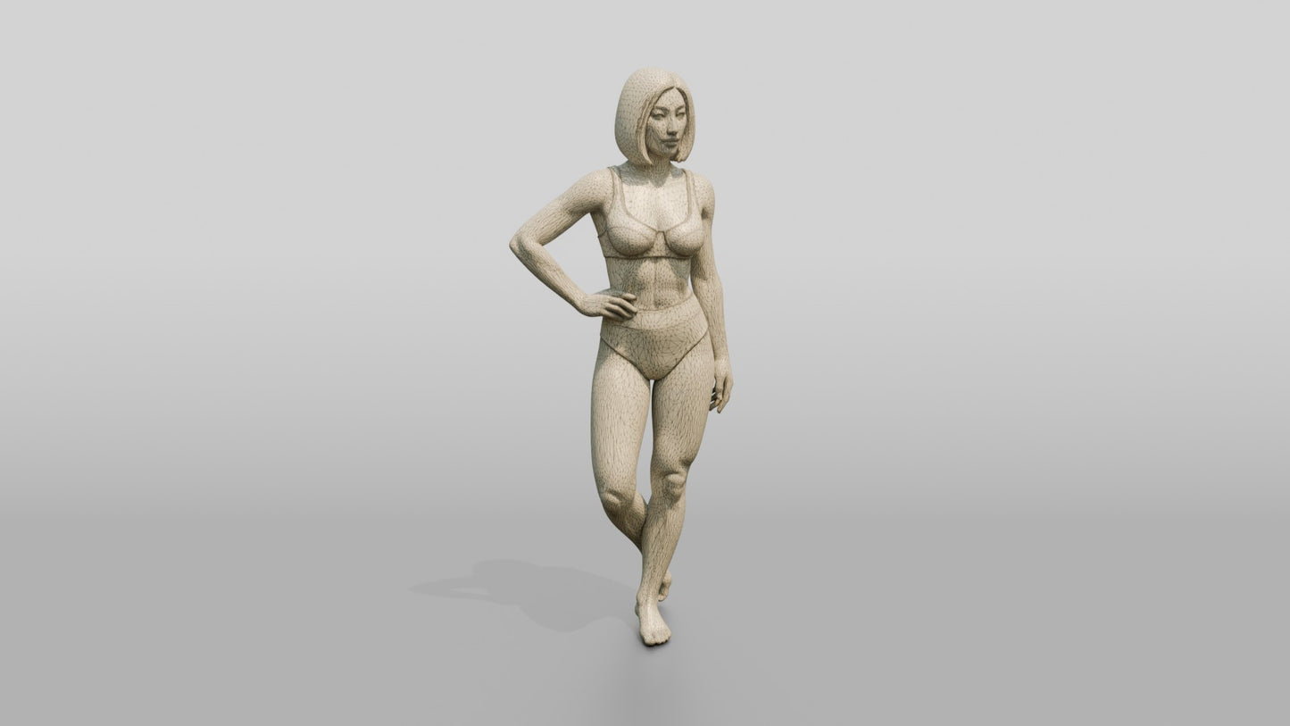 Woman in Mint Two-Piece Swimsuit with Hand on Hip