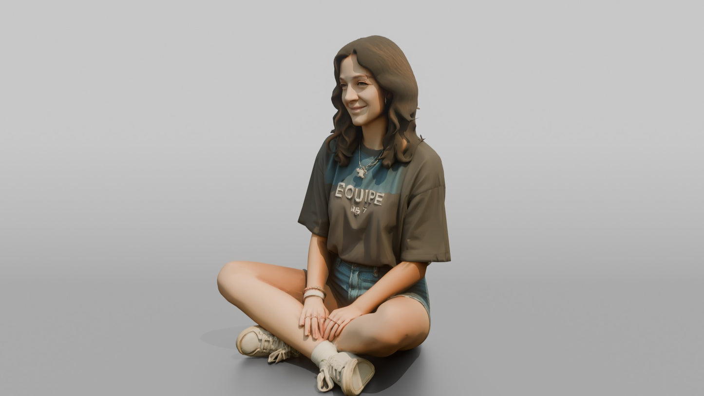 Teenage Girl Sitting Cross-Legged in Streetwear