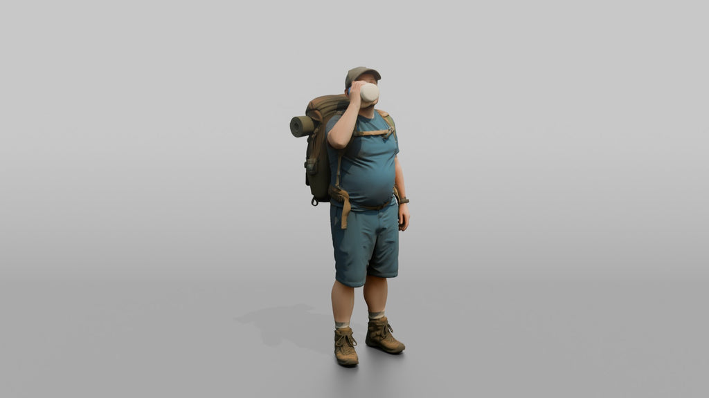 Hiker Drinking from a Large Sports Bottle