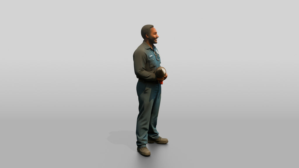 Mechanic Holding a Wheel Balancer Cone