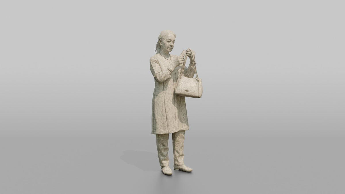 Woman Customer Examining The Price Tag On A Handbag - wireframe topology preview
