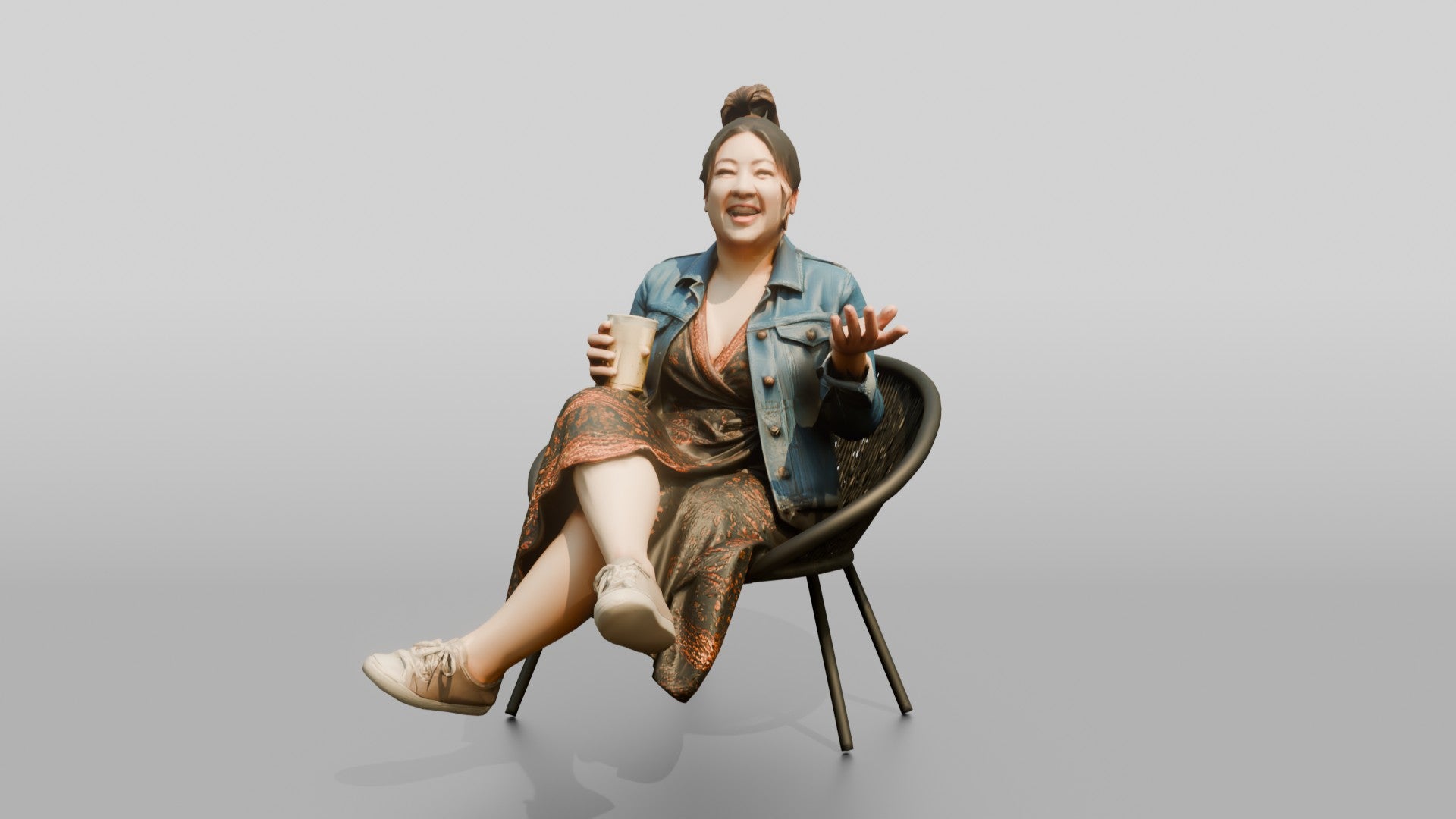 Chinese Woman Laughing While Seated with Coffee