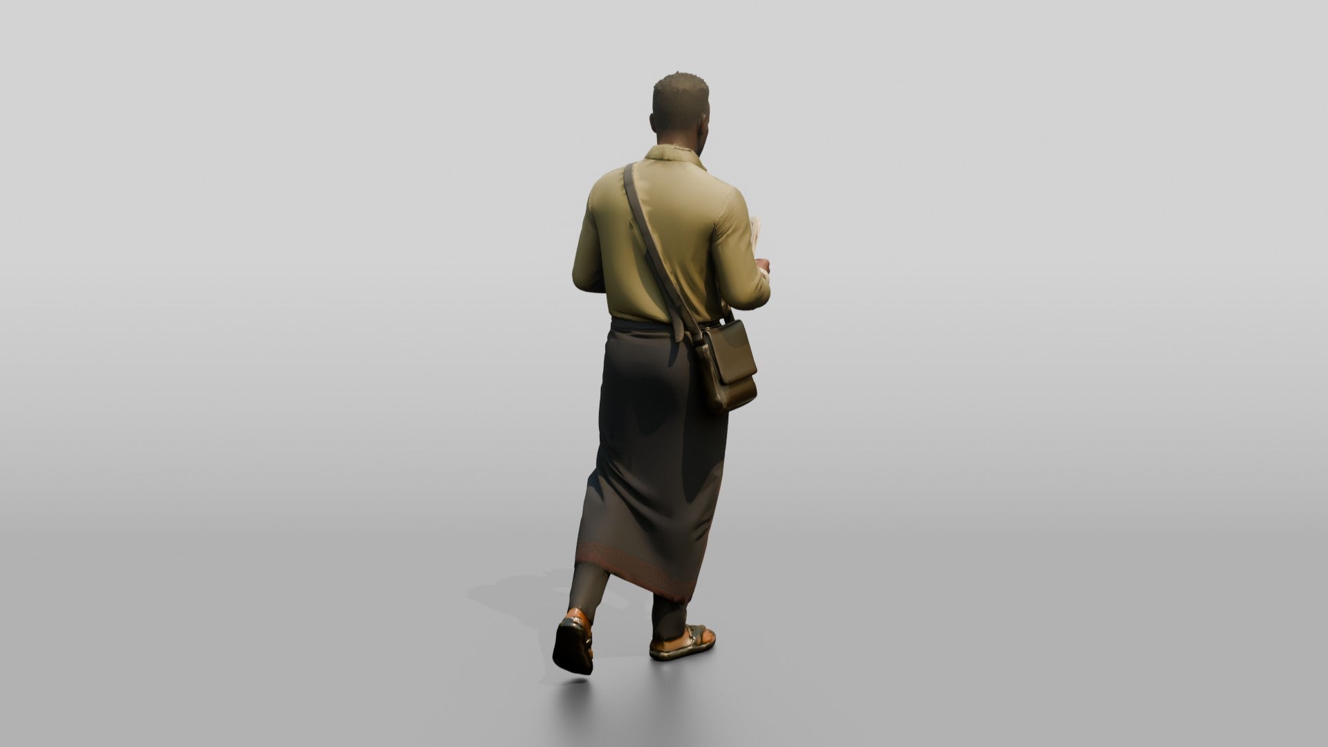 African Man Reading a Map in a Wrap Skirt
