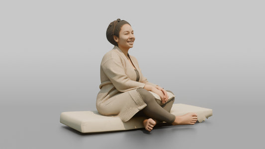 Spa Client Woman Sitting On A Daybed, Legs Crossed, Holding A Small Pillow - 3D character model