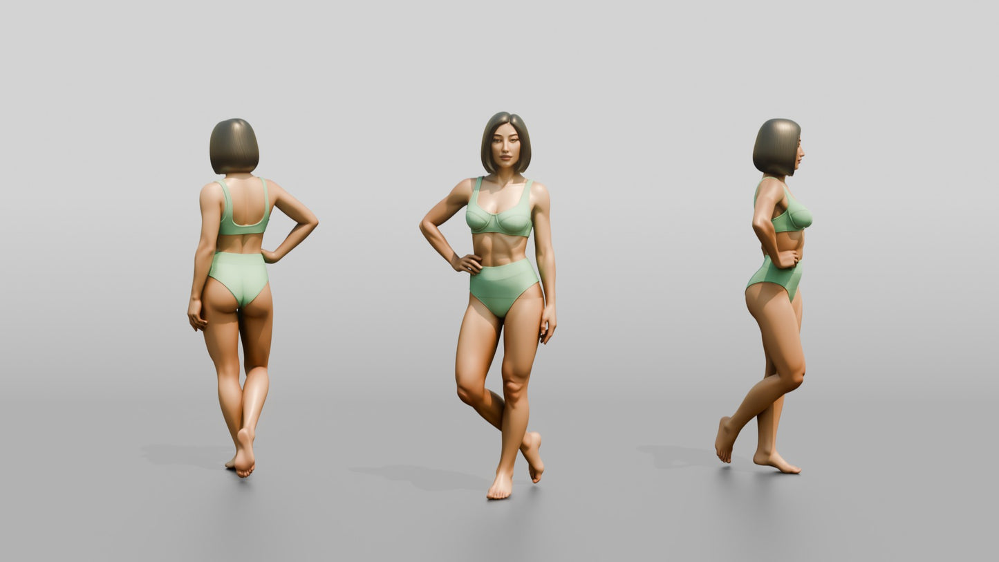 Woman in Mint Two-Piece Swimsuit with Hand on Hip