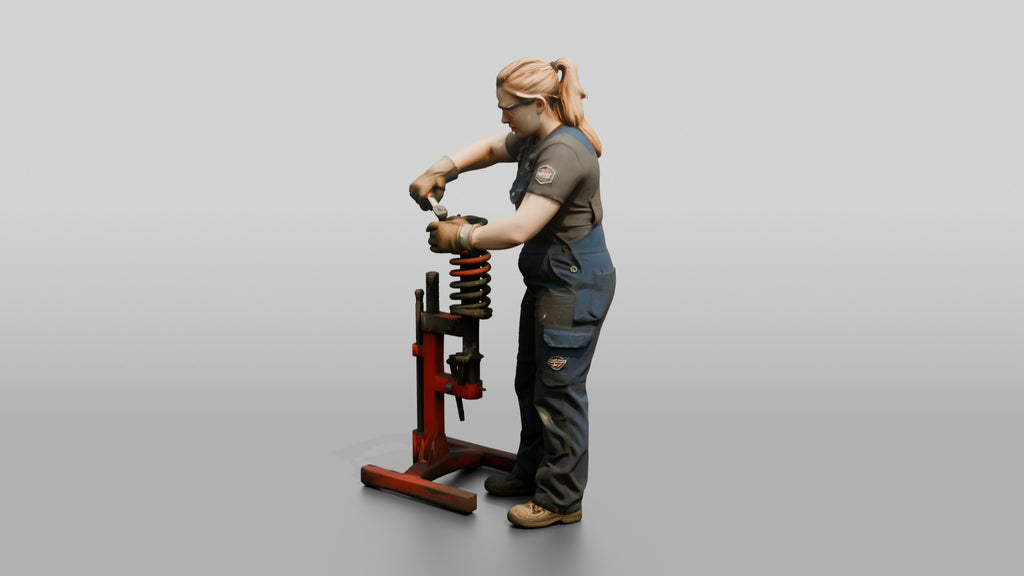 Mechanic Replacing a Shock Absorber
