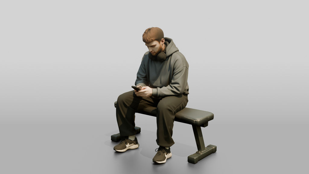 Man Sitting on Fitness Bench