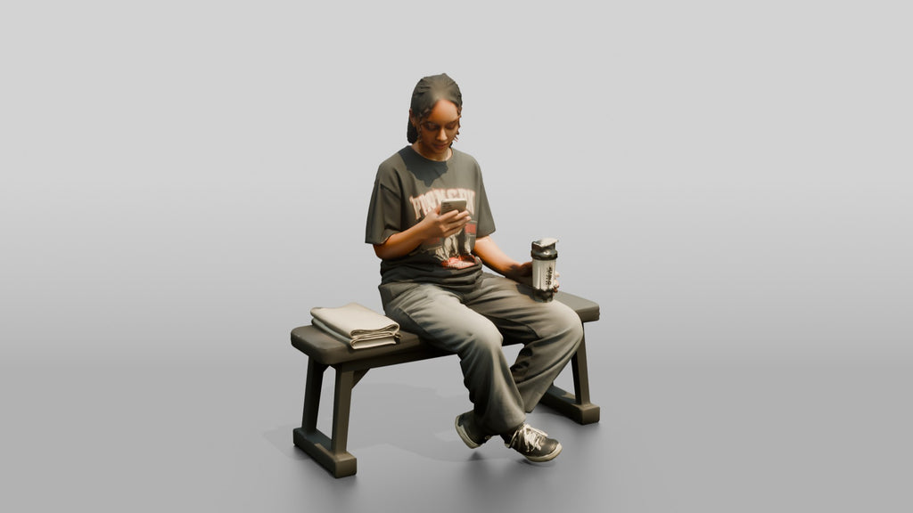 Woman Sitting with Protein Shaker