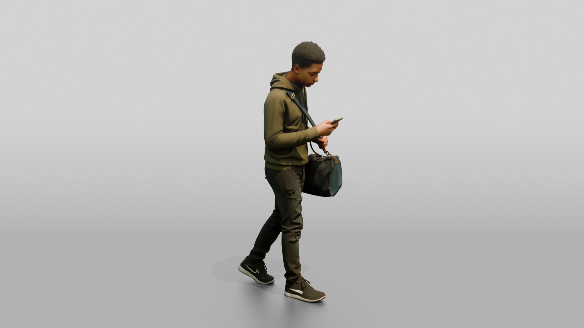 Young Black Man Walking and Looking at Phone with Duffel Bag