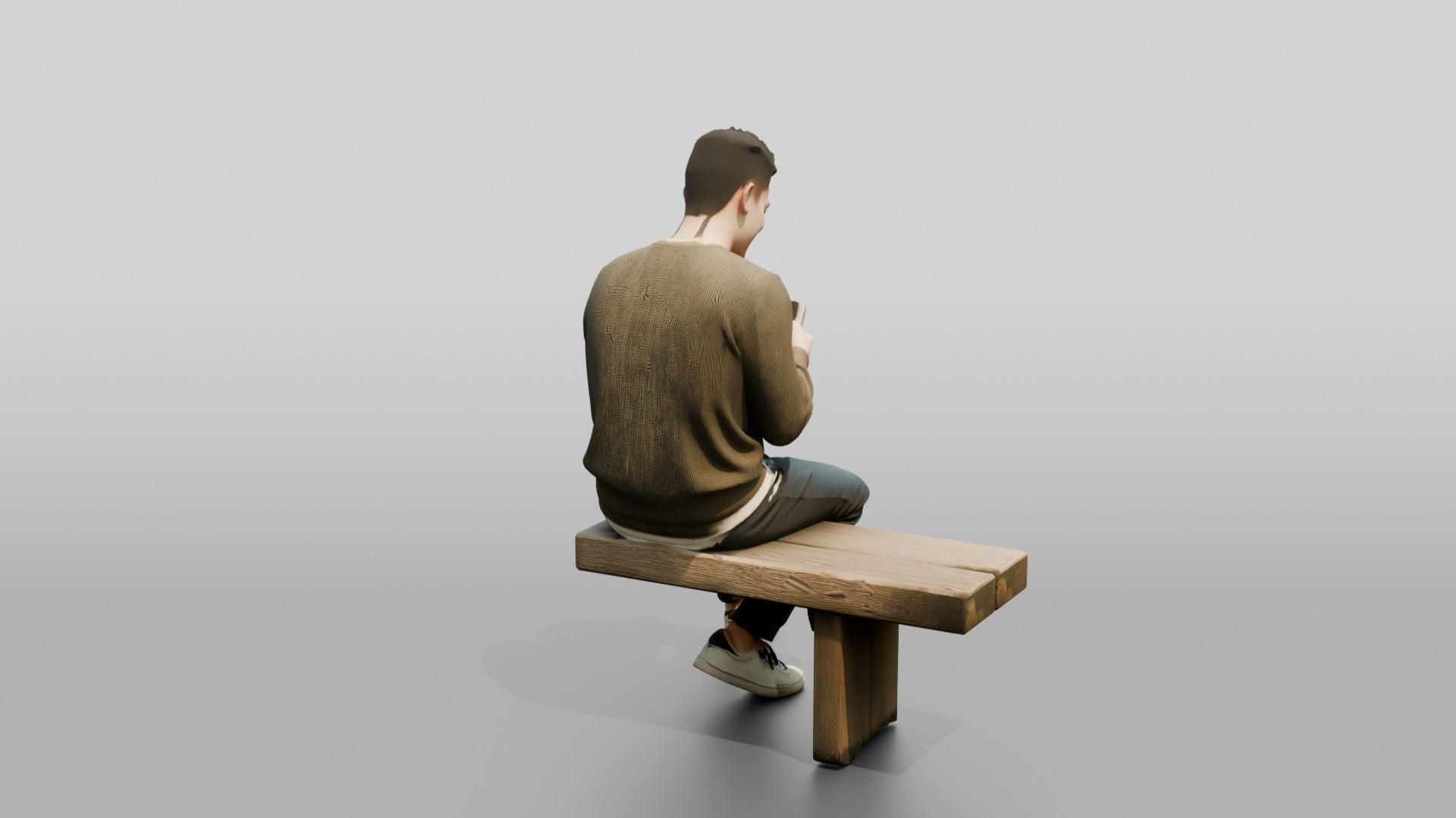Young Chinese Man Relaxing on a Bench with Phone