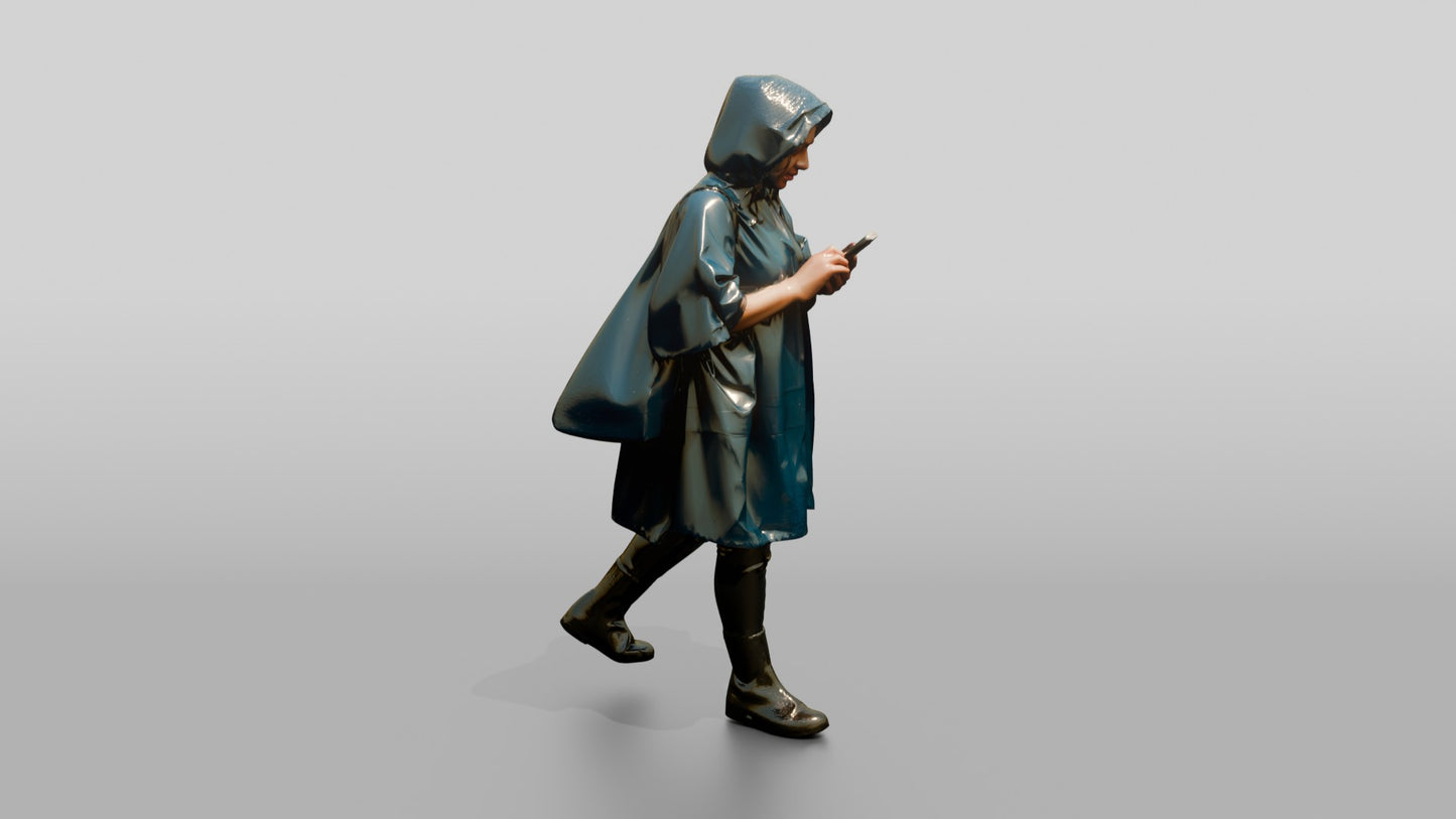 Indian Woman in Blue Poncho Checking Phone