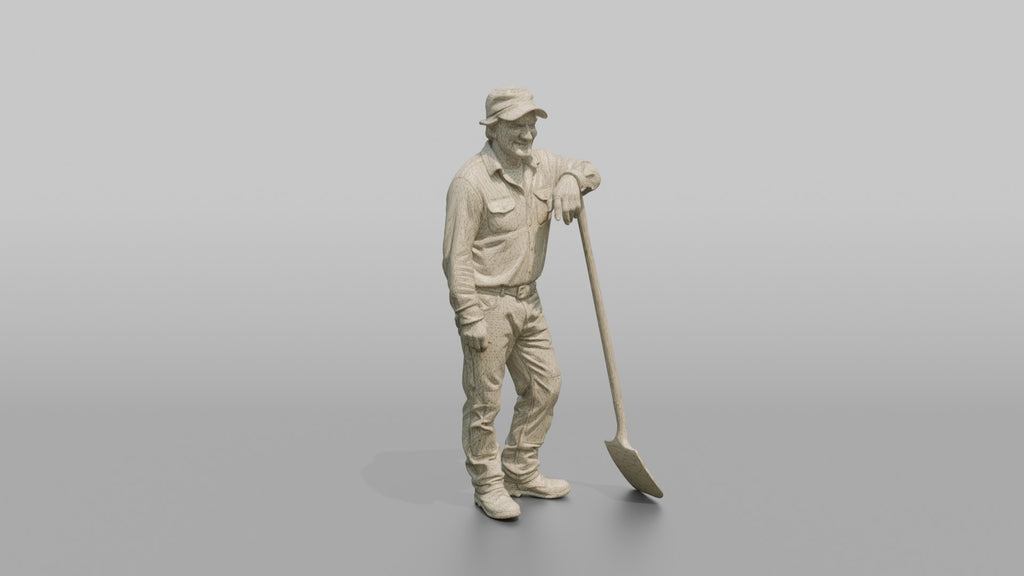 Farmer Leaning On Long Wooden Shovel
