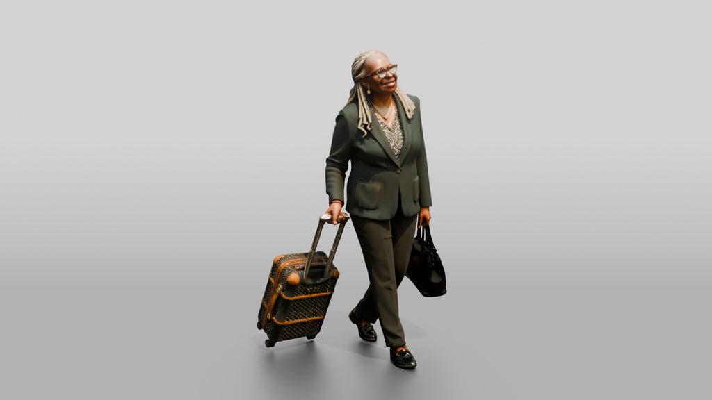 Elderly Black Woman in Green Blazer with Patterned Luggage