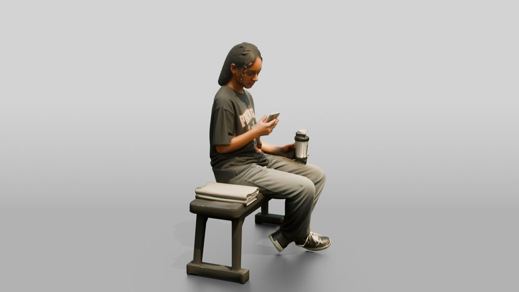 Woman Sitting with Protein Shaker