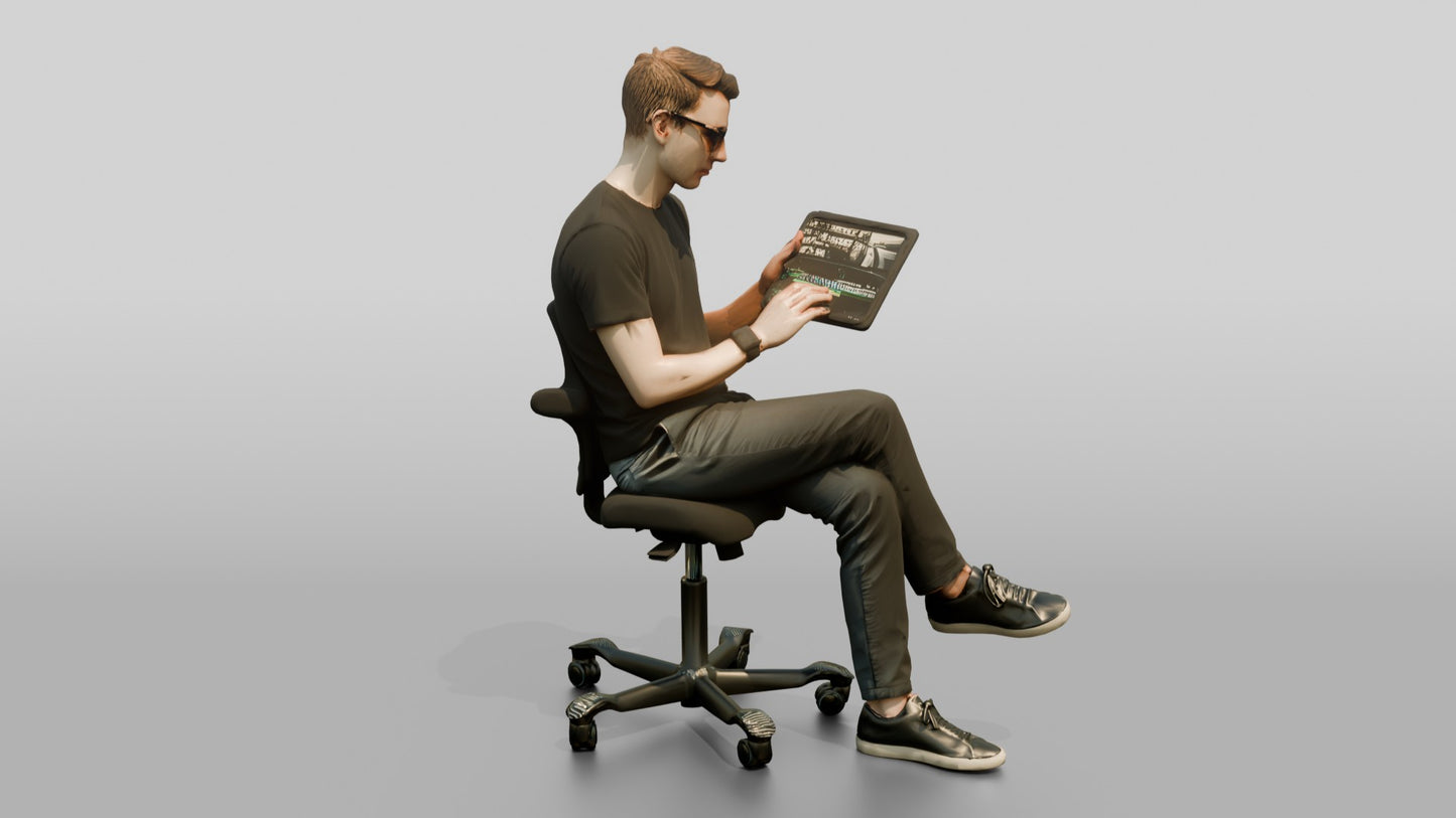 Man Seated with a Tablet and Glasses