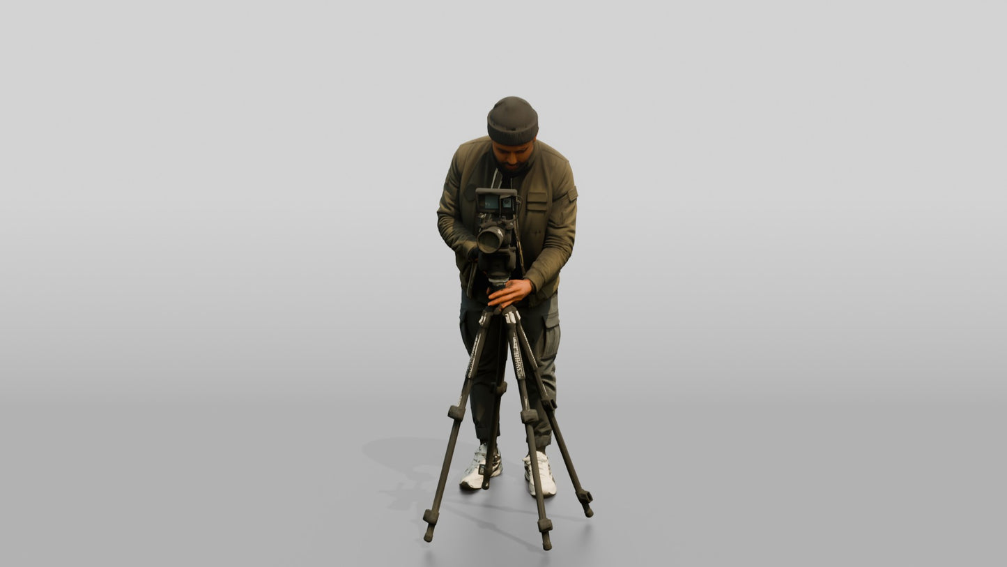 Videographer Setting Up a Camera