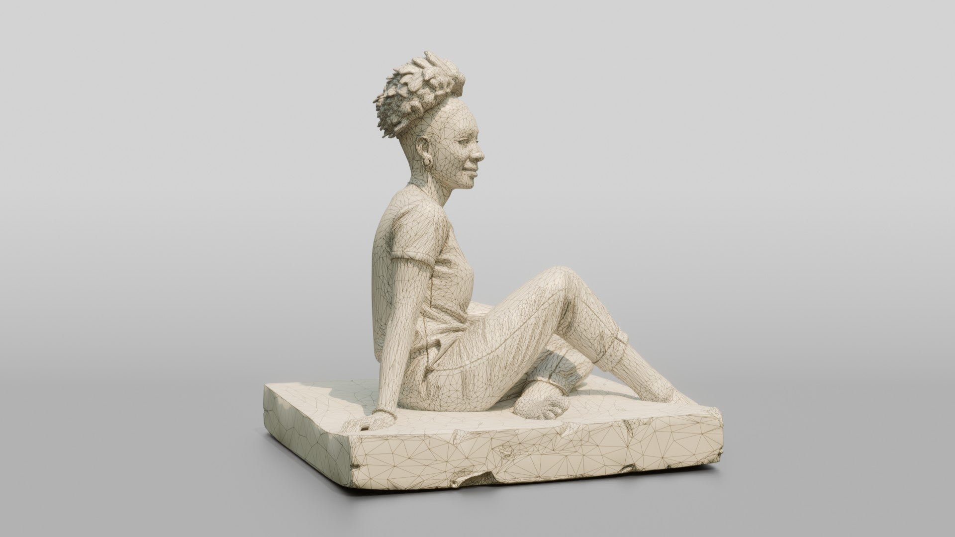 Homeless Woman Sitting on a Piece of Foam Padding