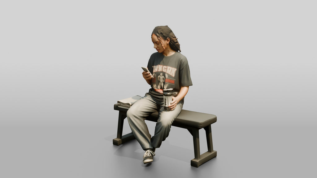 Woman Sitting with Protein Shaker