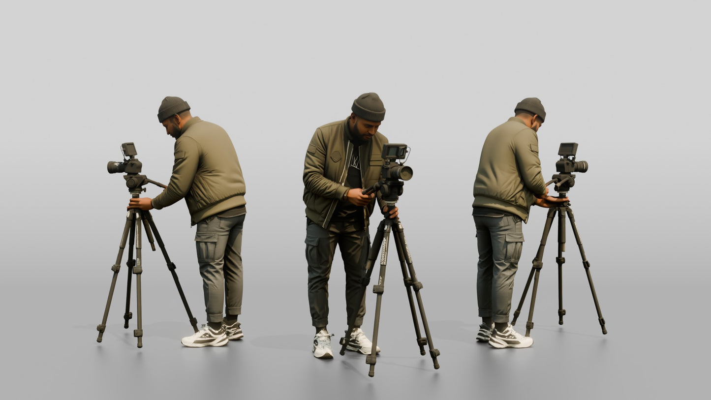 Videographer Setting Up a Camera