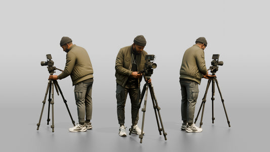 Videographer Setting Up a Camera