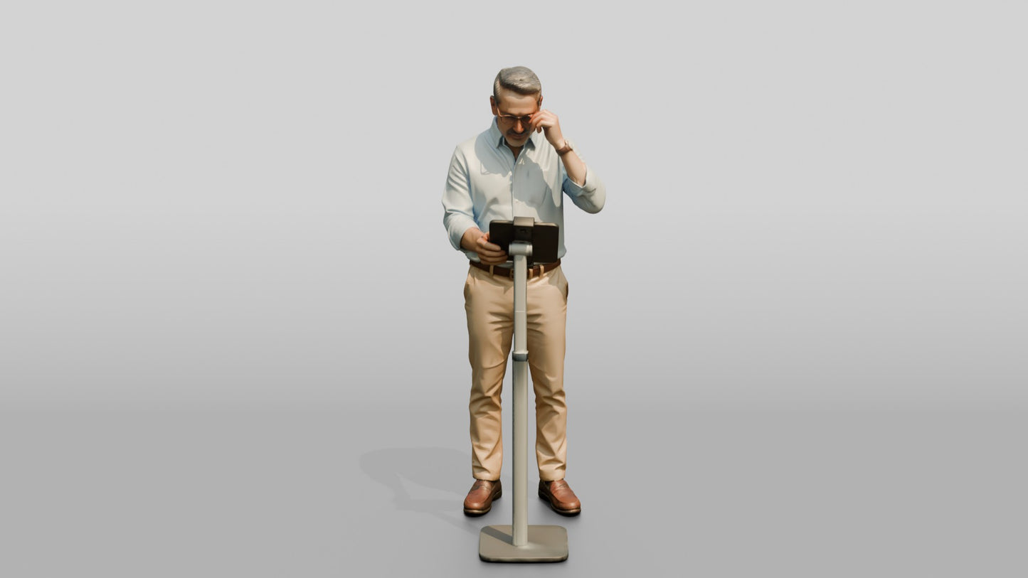 Businessman at a Standing Desk with a Tablet