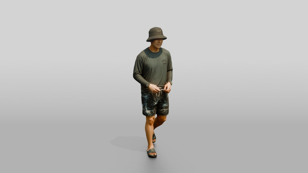 Man Loosening Drawstring on Boardshorts