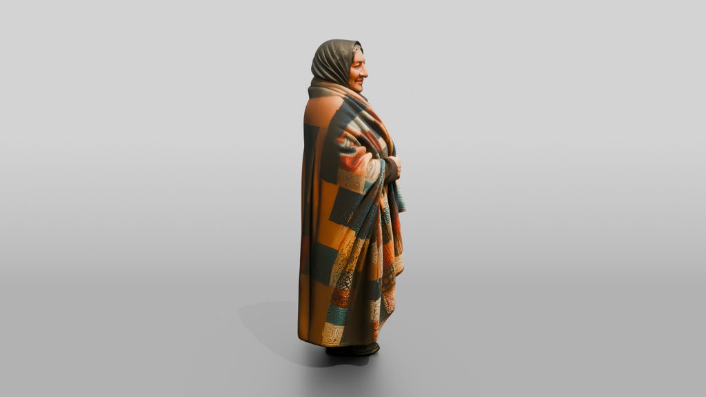 Homeless Woman Draped in a Patchwork Quilt