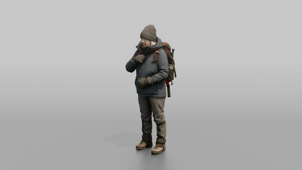 Winter Hiker Zipping Up Her Jacket