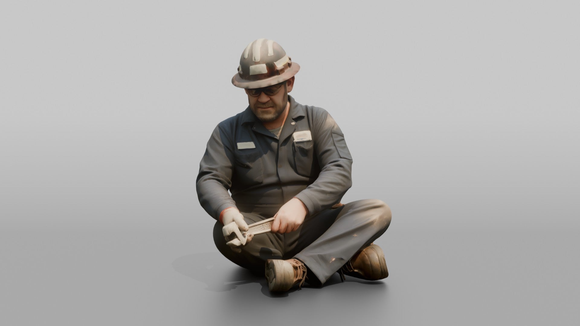 Engineer Tightening a Bolt on a Pipe Fitting