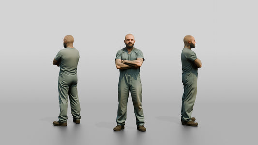 White Male Prisoner Standing with His Arms Crossed Defensively