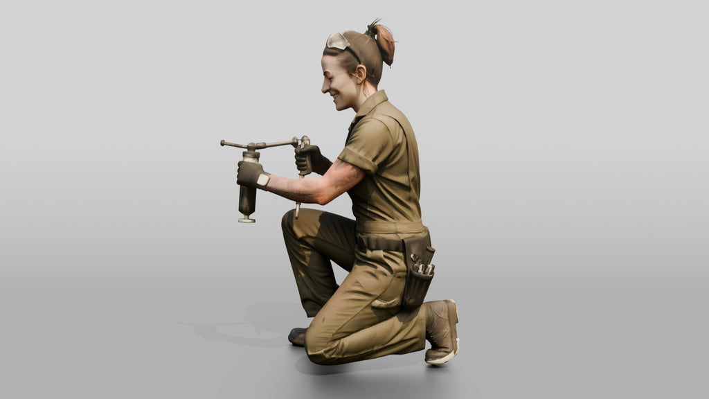 Mechanic Greasing a Suspension Joint