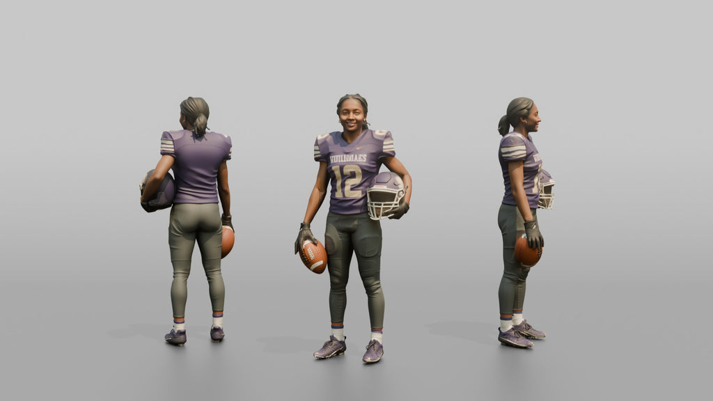 Wide Receiver Standing with the Ball at Her Side