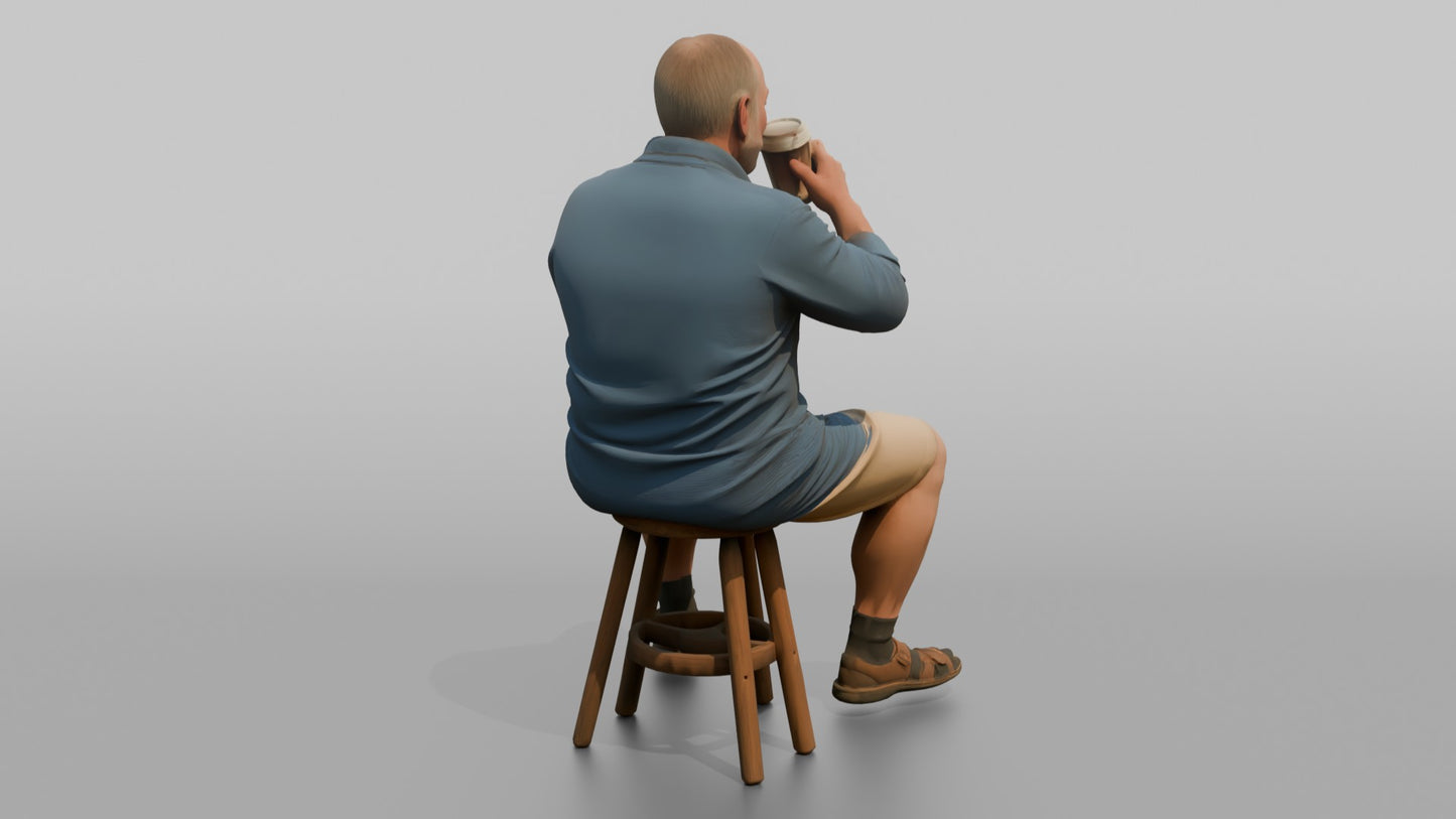 British Man Sitting with a Takeaway Coffee