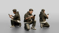 Asian Man Crouched Texting on Phone