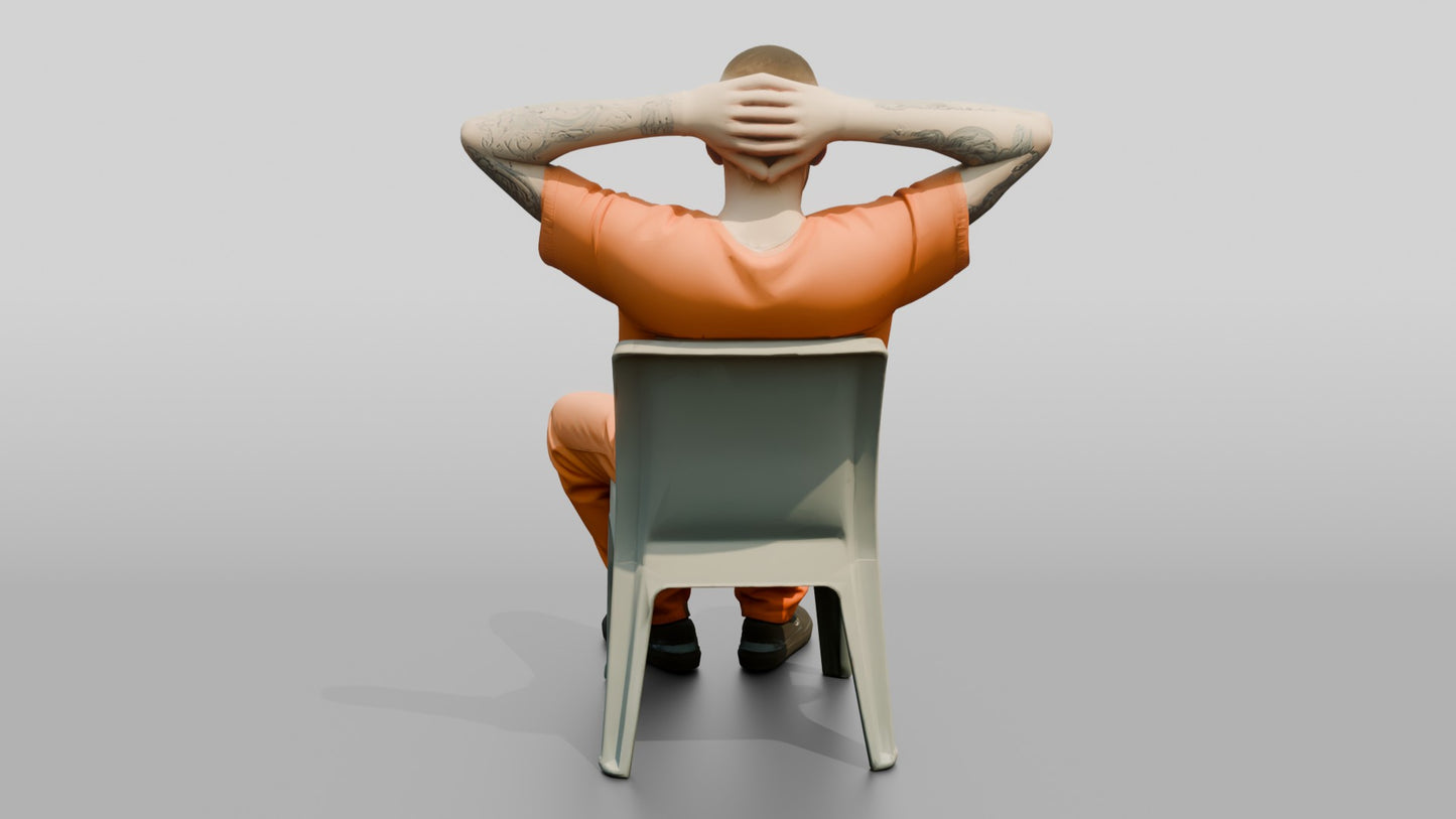 Caucasian Male Prisoner Leaning Back in a Hard Plastic Chair