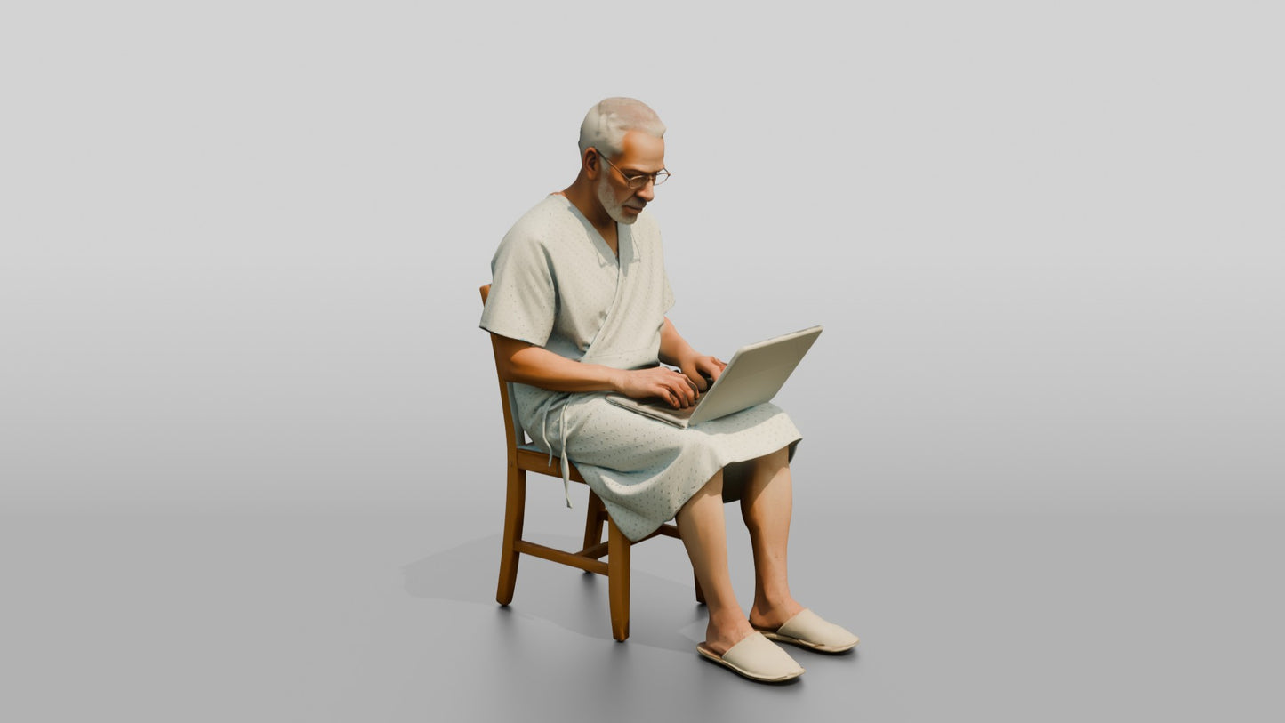 Elderly Man Patient Using a Laptop