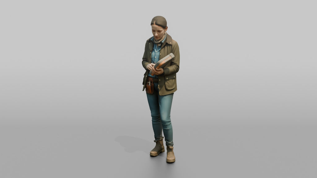 Farmer Holding Livestock Health Monitor Device