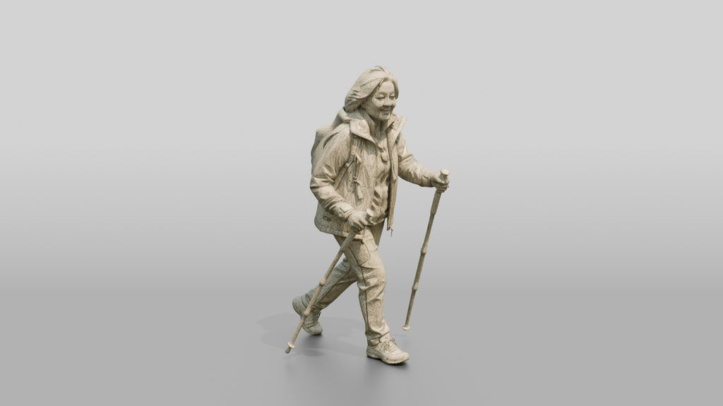Elderly Chinese Woman Hiking with Trekking Poles