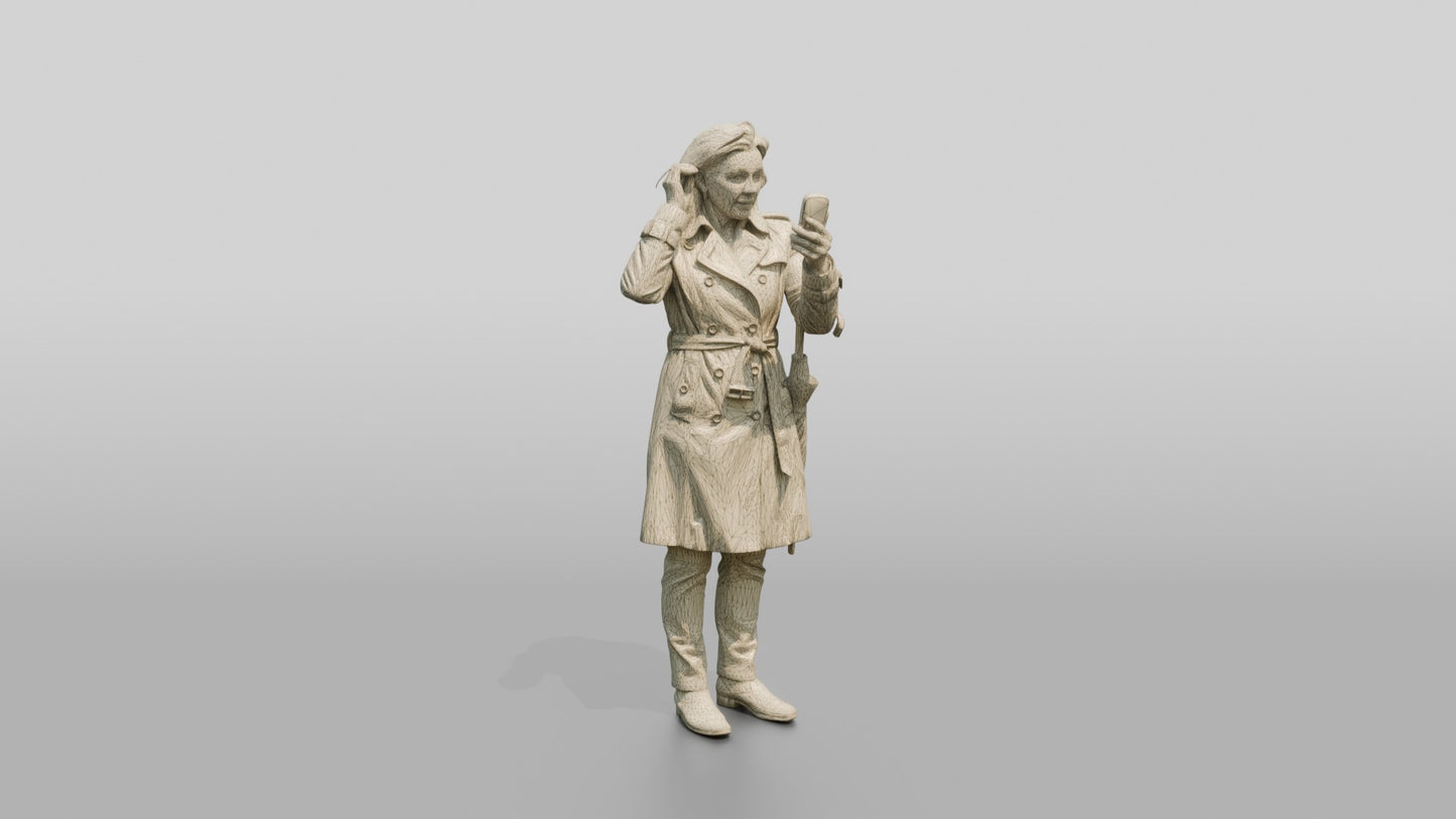 White Woman in Trench Coat Fixing Her Hair