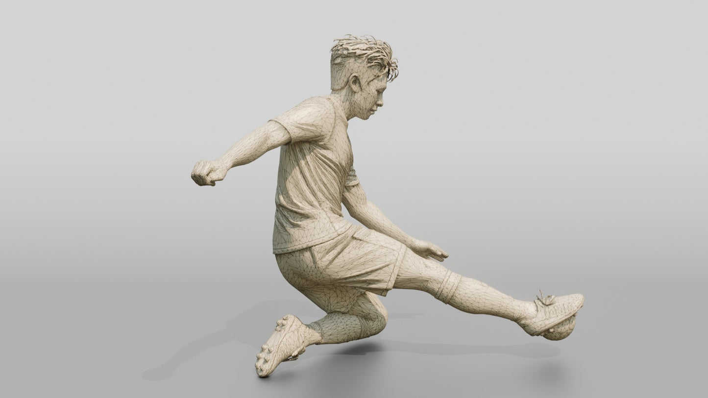 Soccer Player Executing a Sliding Tackle