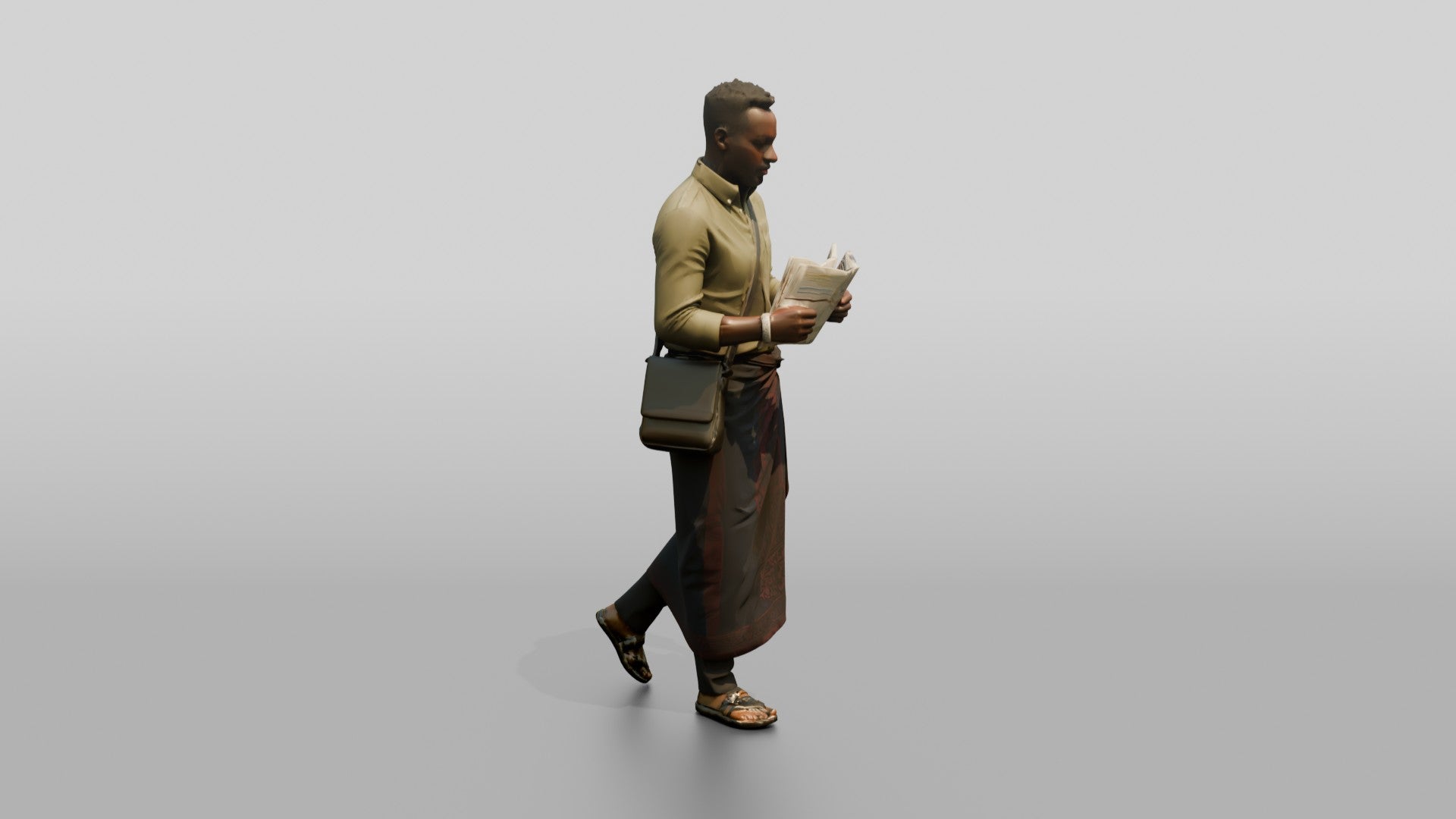 African Man Reading a Map in a Wrap Skirt