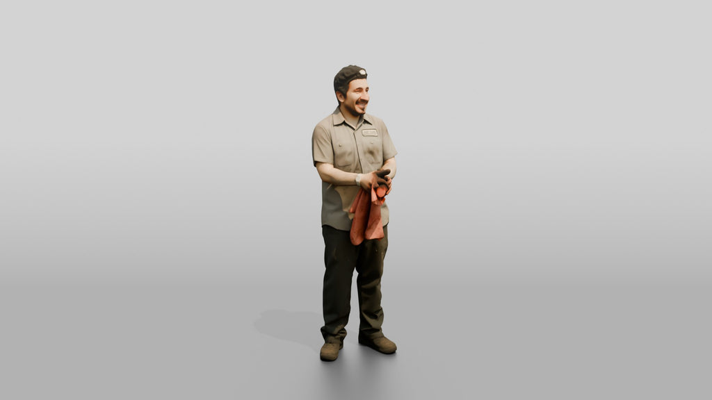 Mechanic Wiping Hands with a Shop Rag