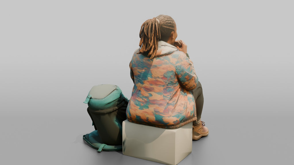 Hiker Sitting and Eating an Energy Bar