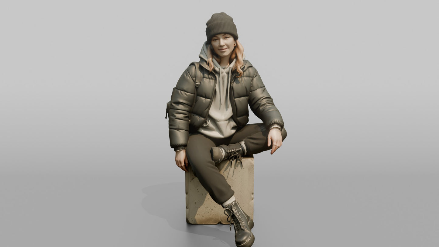 Woman Sitting in a Cropped Puffer Jacket
