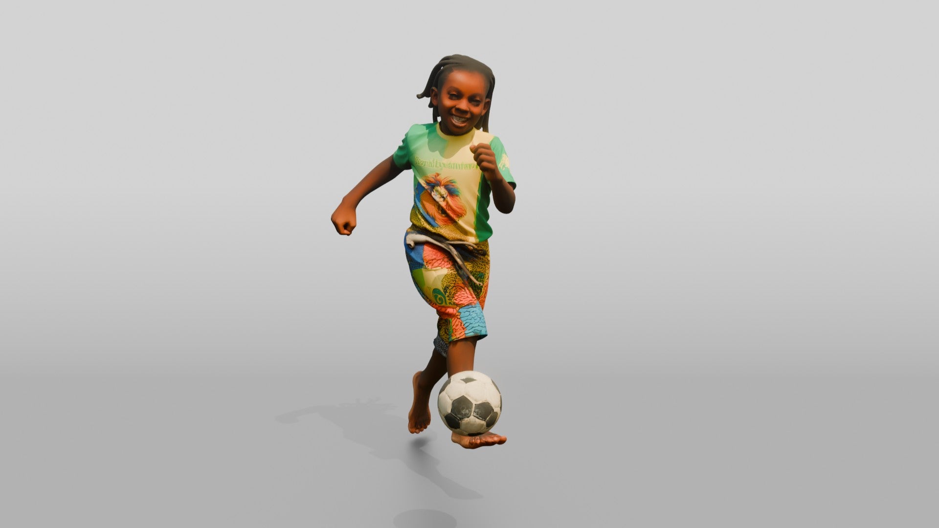 African Boy Playing Soccer in Patchwork Shorts