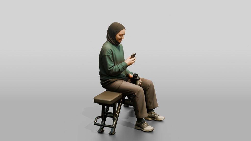 Woman in Sports Hijab Sitting
