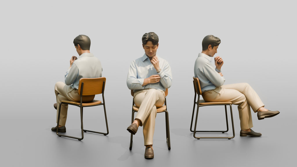 Businessman Sitting in Light Blue Shirt