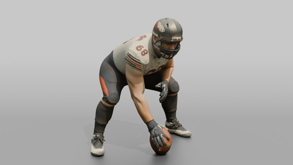 Center Ready to Snap the Ball