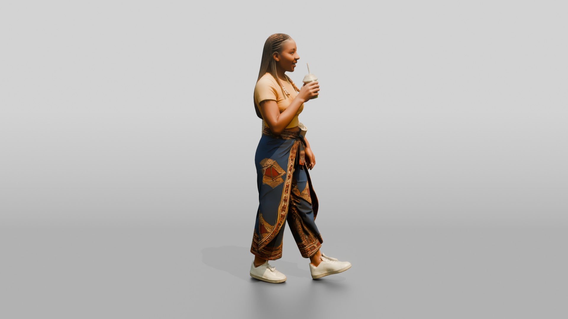 Curvy African Woman Drinking a Smoothie in Wrap Trousers
